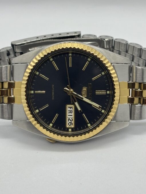 SNXJ90 black dial