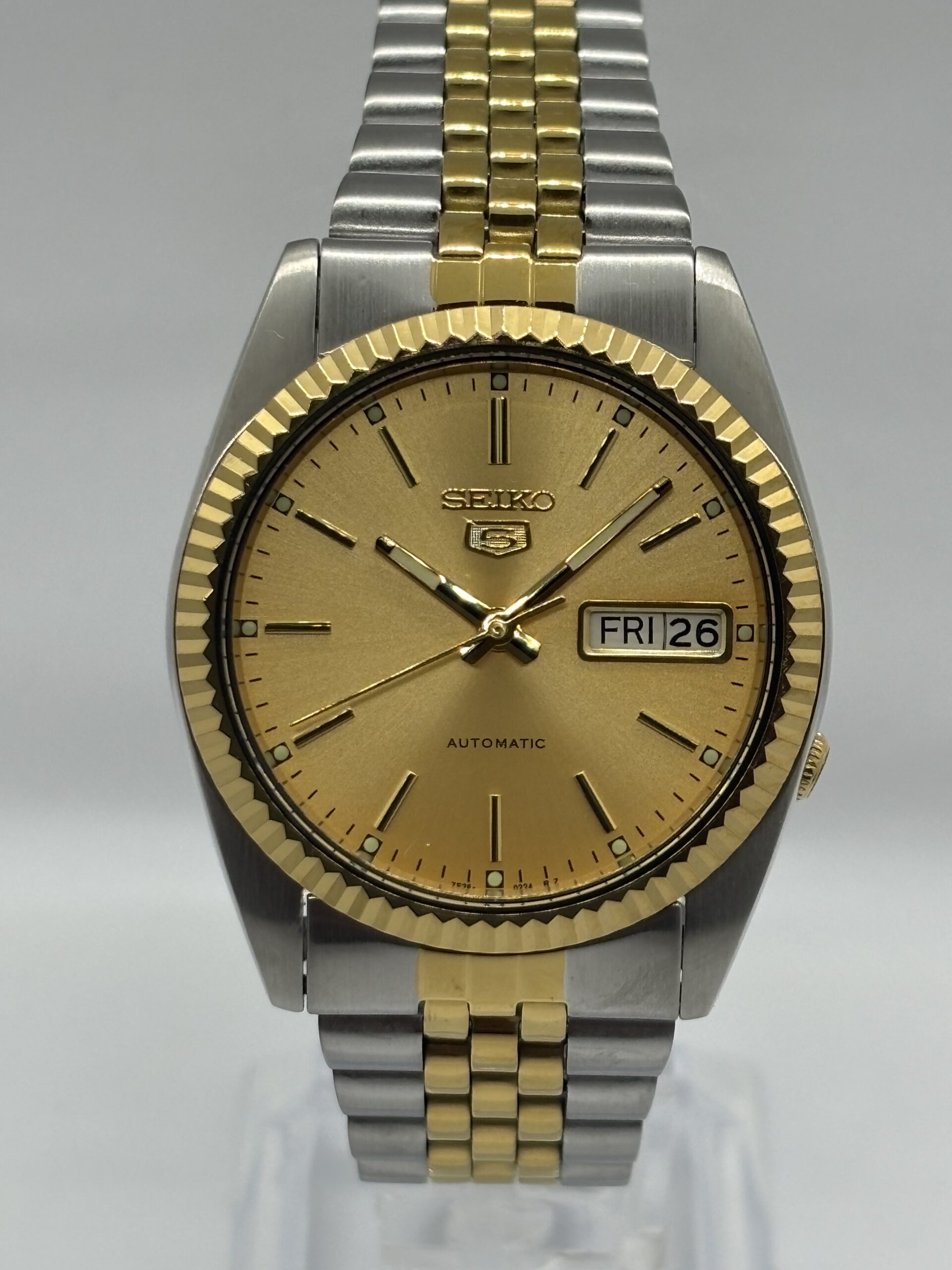 Seiko_5_SNXJ90_SNXJ92_American_Seiko_American_Psycho_datejust_watch._Automatic_watch_7s26_jubilee_bracelet_fluted_bezel_gold_dial_3