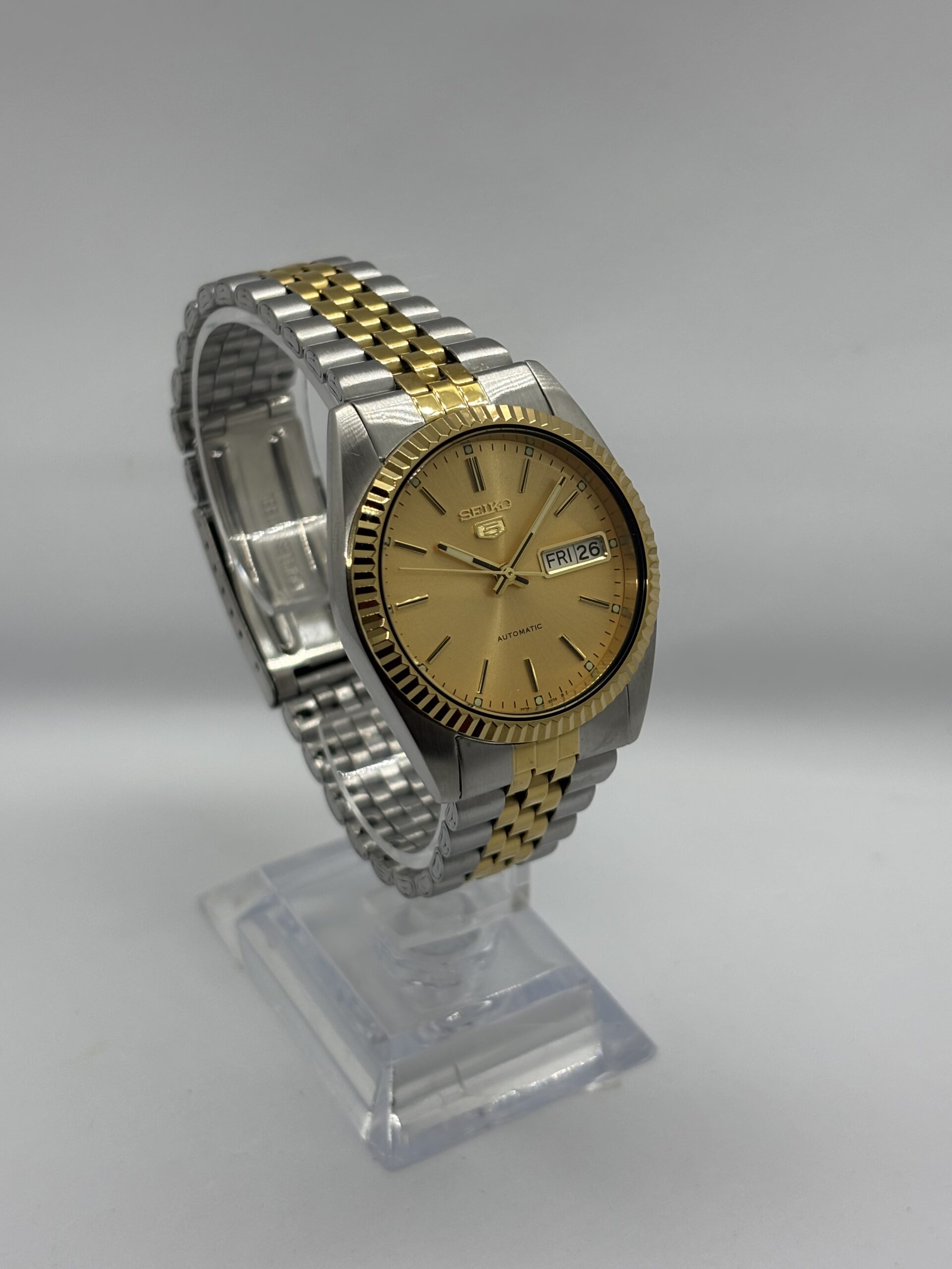 Seiko_5_SNXJ90_SNXJ92_American_Seiko_American_Psycho_datejust_watch._Automatic_watch_7s26_jubilee_bracelet_fluted_bezel_gold_dial_4