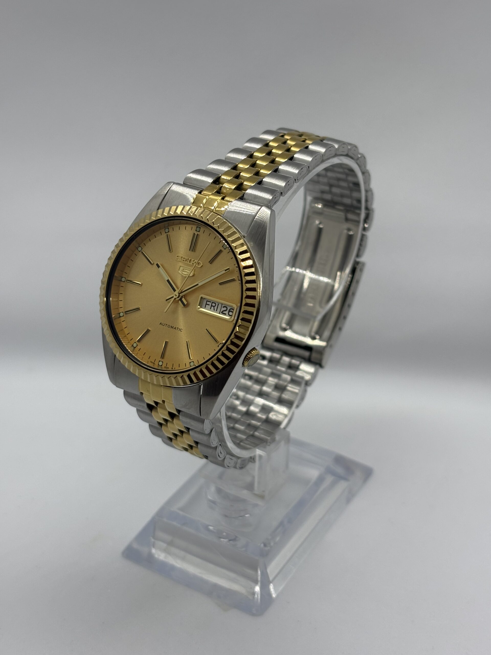 Seiko_5_SNXJ90_SNXJ92_American_Seiko_American_Psycho_datejust_watch._Automatic_watch_7s26_jubilee_bracelet_fluted_bezel_gold_dial_6