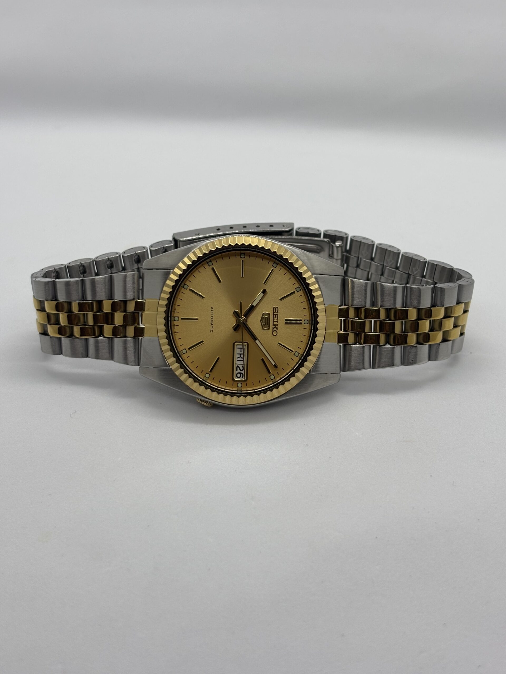 Seiko_5_SNXJ90_SNXJ92_American_Seiko_American_Psycho_datejust_watch._Automatic_watch_7s26_jubilee_bracelet_fluted_bezel_gold_dial_7